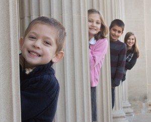 Kids around pillars